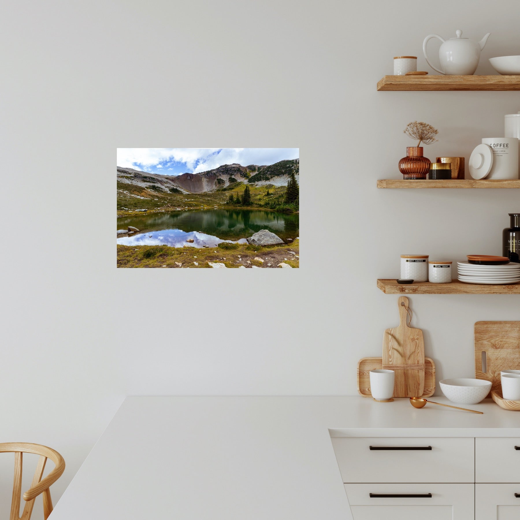 Mountain reflection on an alpine lake in Whistler mountain in British Columbia framed print