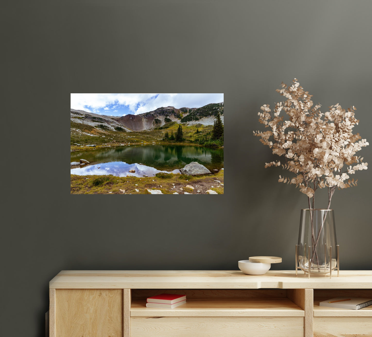 Mountain reflection on an alpine lake in Whistler mountain in British Columbia framed print