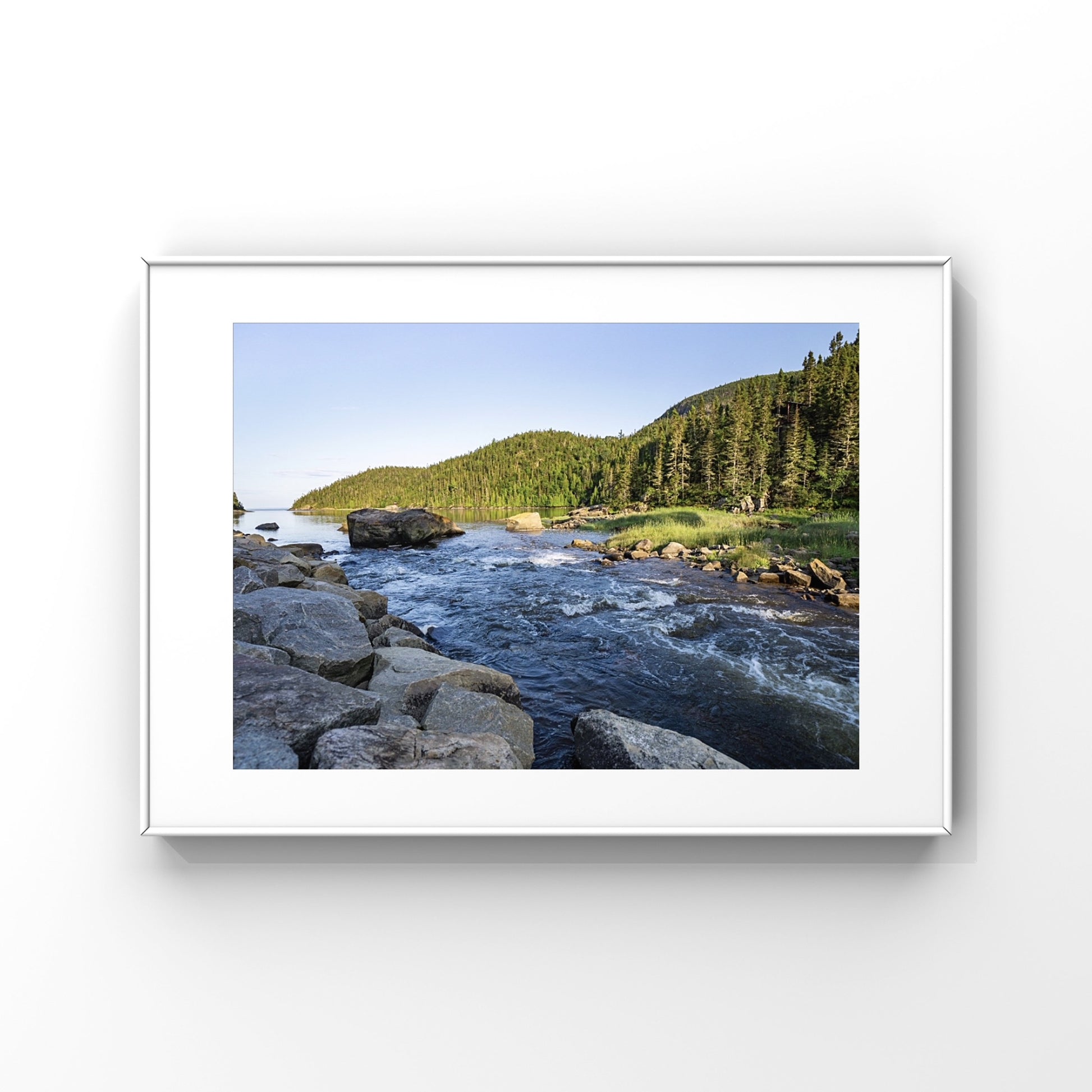 Photography print of a river flowing into the sunlight mountains in Charlevoix, Quebec