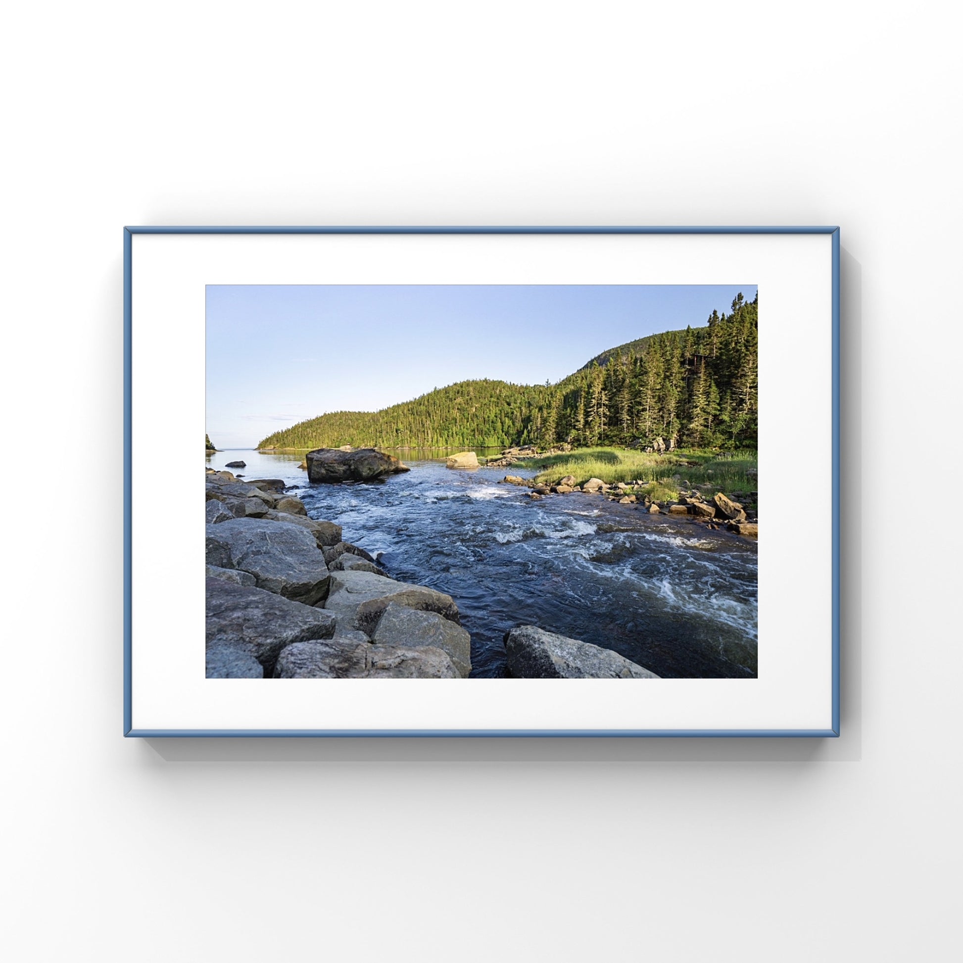 Photography print of a river flowing into the sunlight mountains in Charlevoix, Quebec