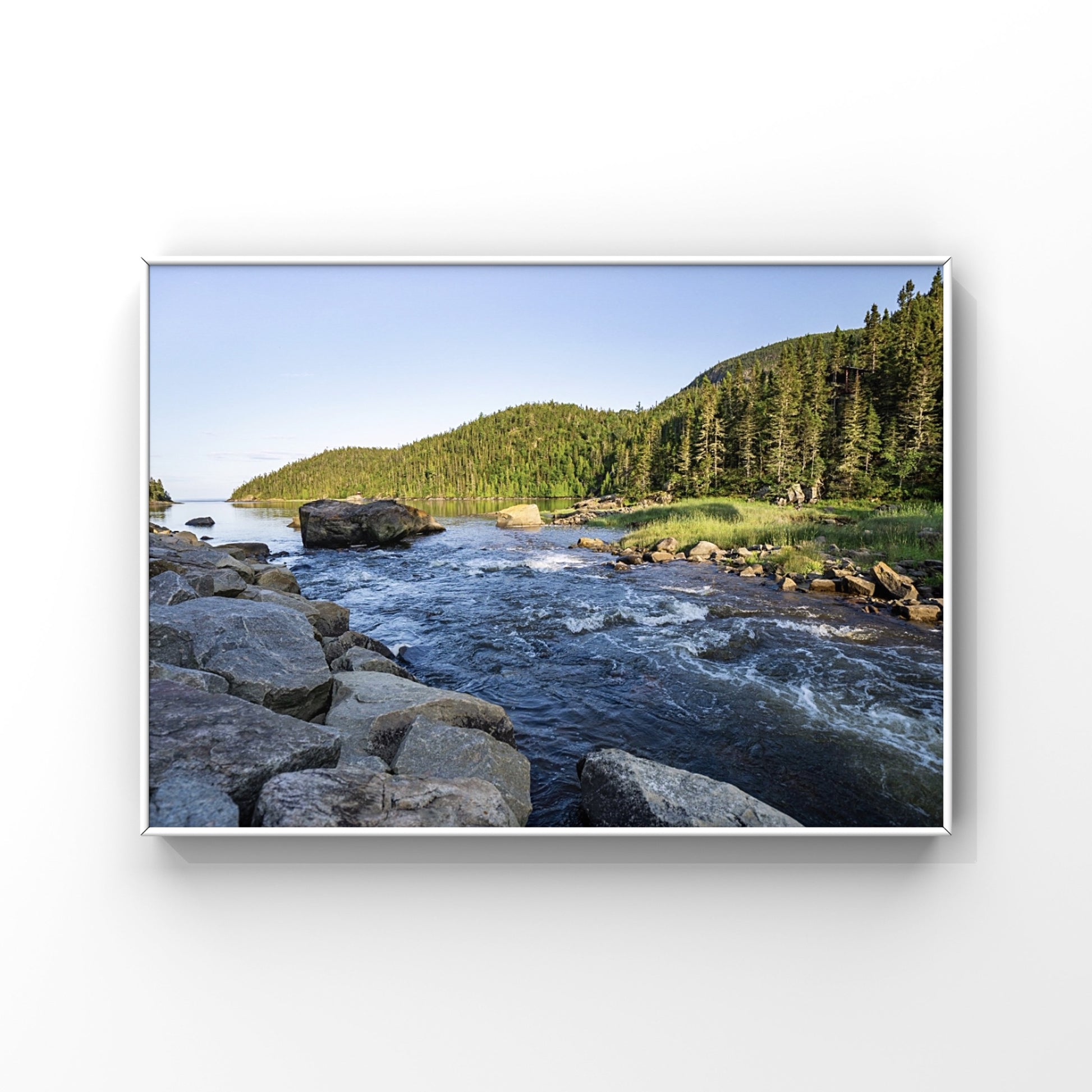 Photography print of a river flowing into the sunlight mountains in Charlevoix, Quebec