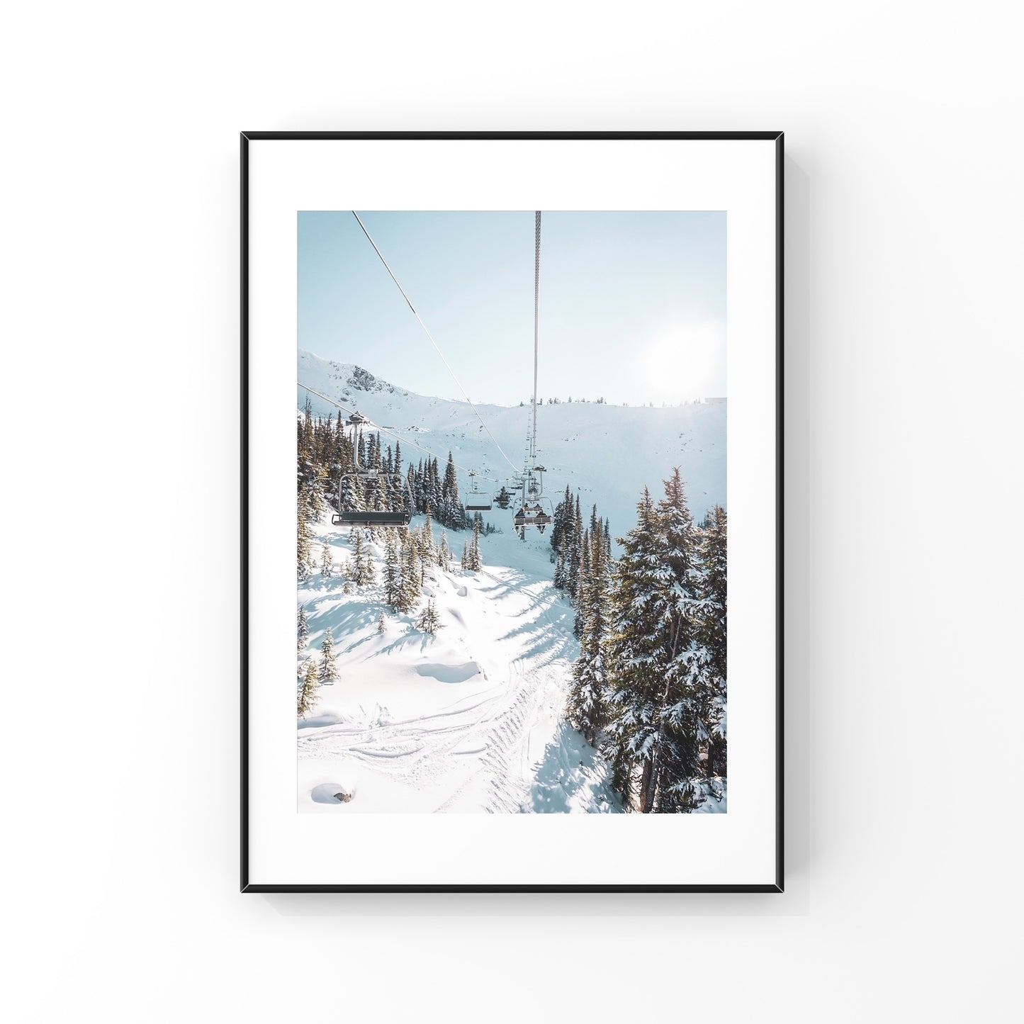 Photography print poster of Jersey Cream chairlift in Whistler on a sunny bluebird day with snowy trees 