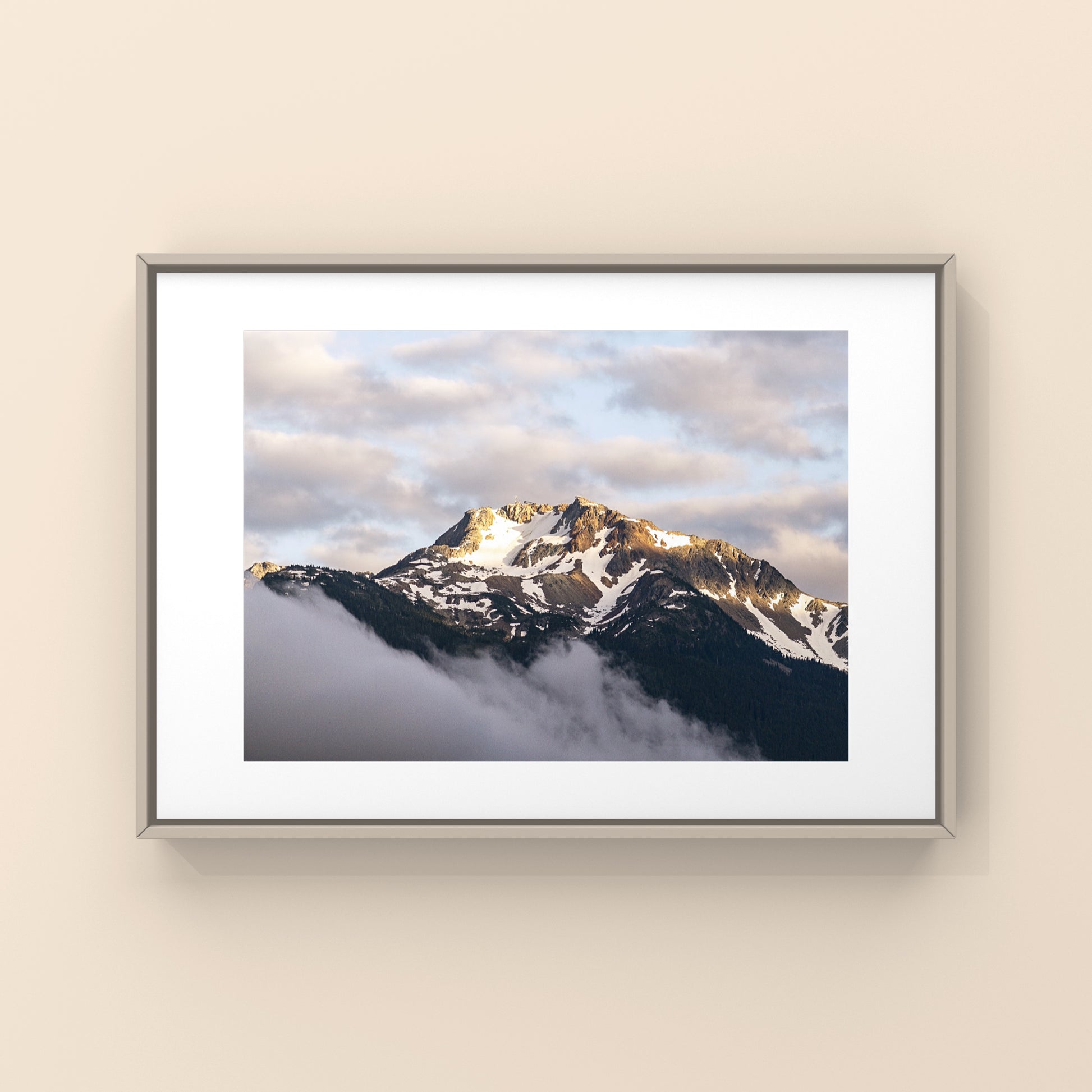 This is Whistler Mountain at sunset, the clouds looked like cotton candy, the mountain was glowing, and it was like a dream