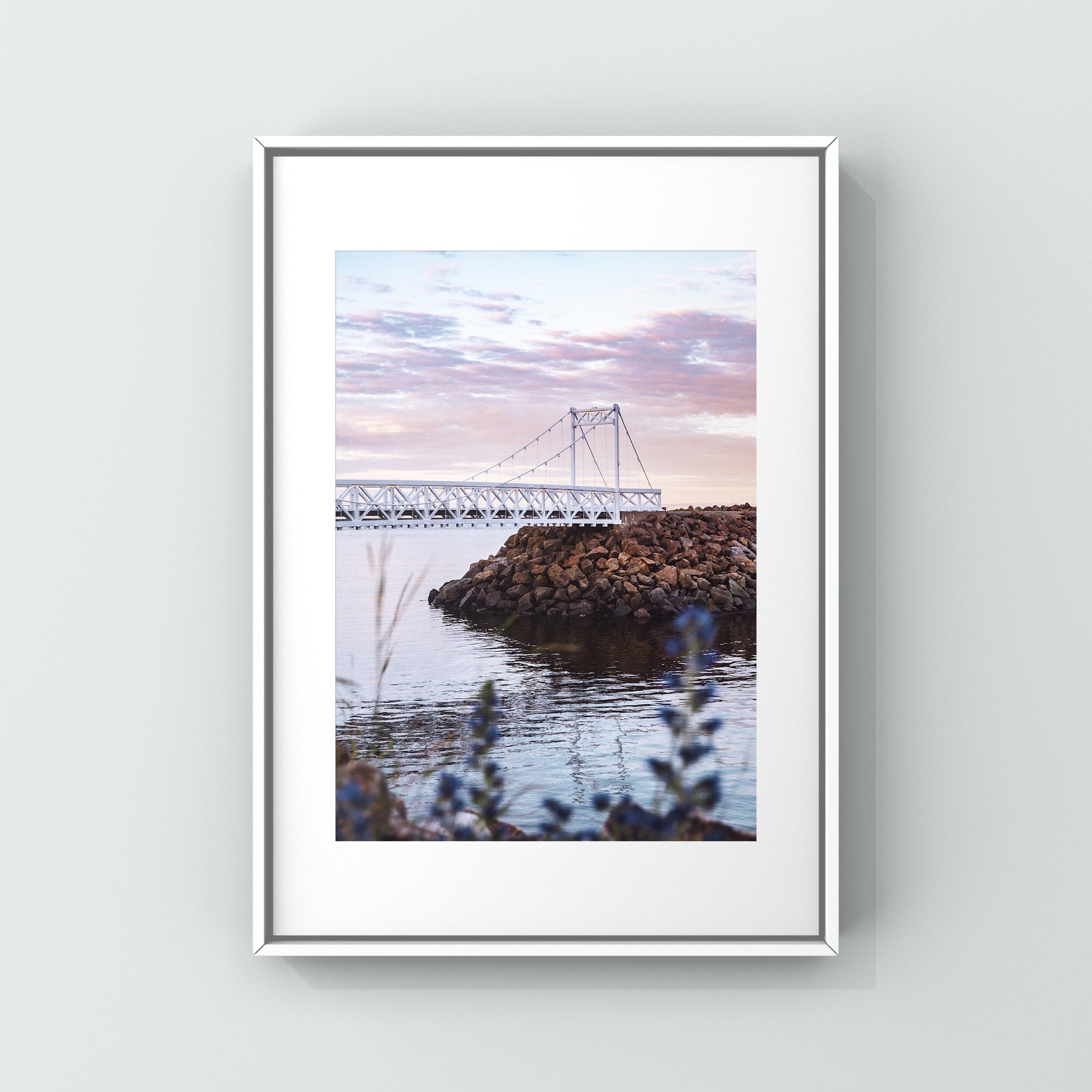 Photography print of a white bridge in a pink and lilac sunset located on the shores of the St-Lawrence river in La Malbaie