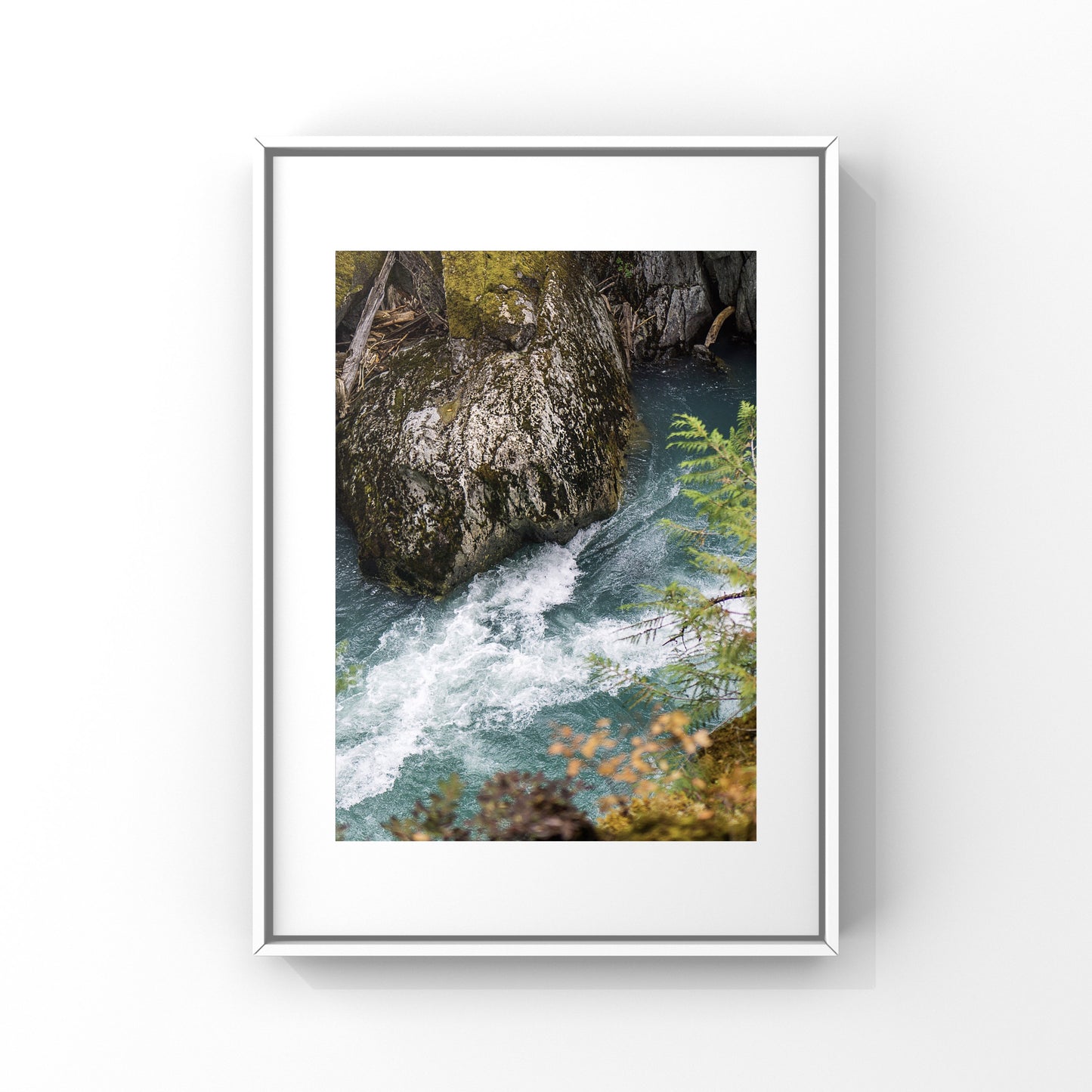 Aerial view of a glacier-fed river with surrounding nature and cliffs, photography print of Whistler, British Columbia