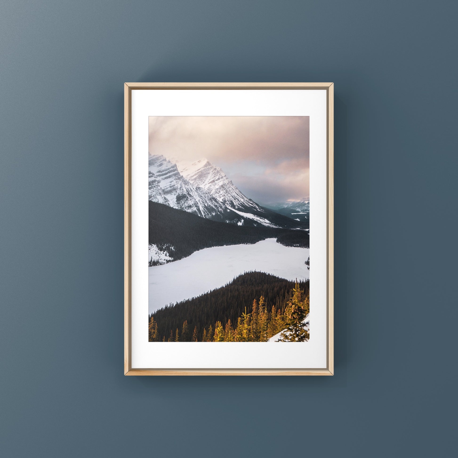 Peyto Lake at sunset in the snow with a pink sky mountain photography print in Alberta