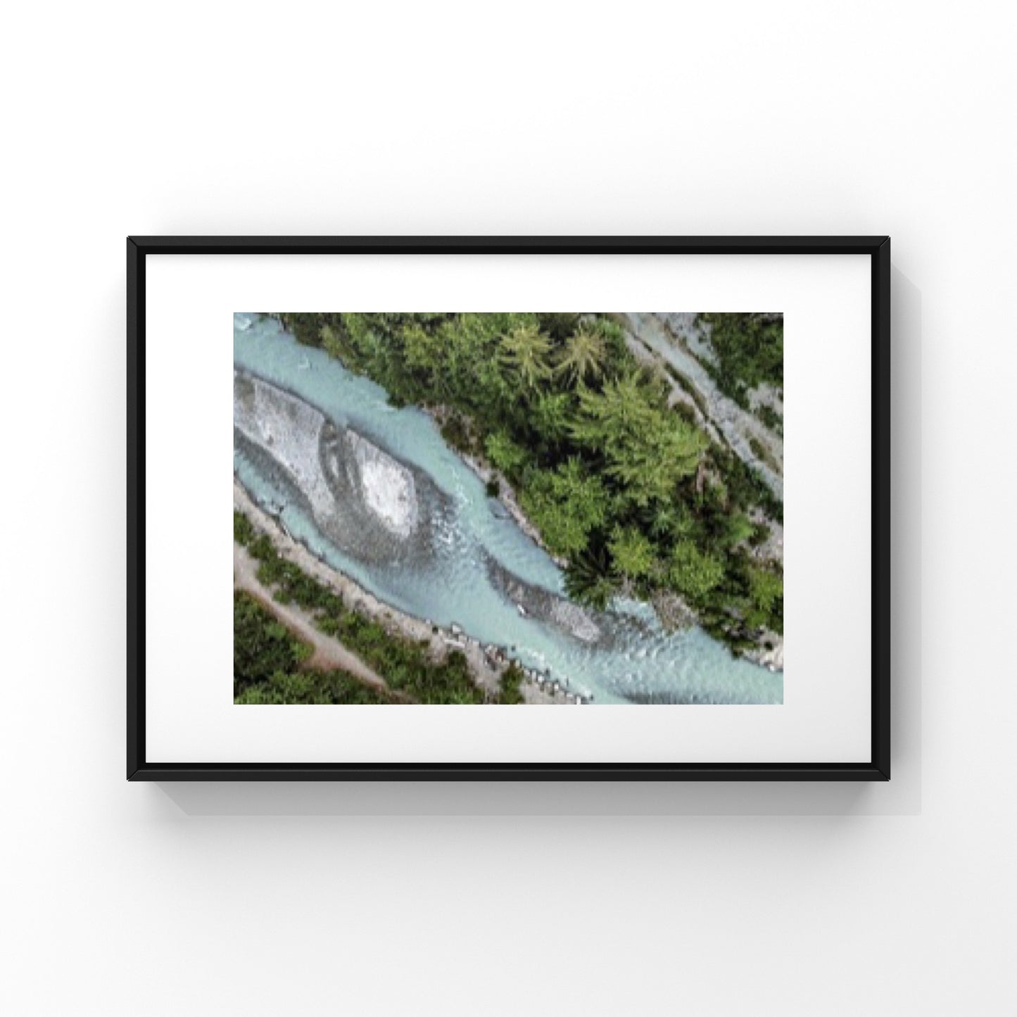 Aerial photography of a glacier-fed river creek in Whistler, British Columbia