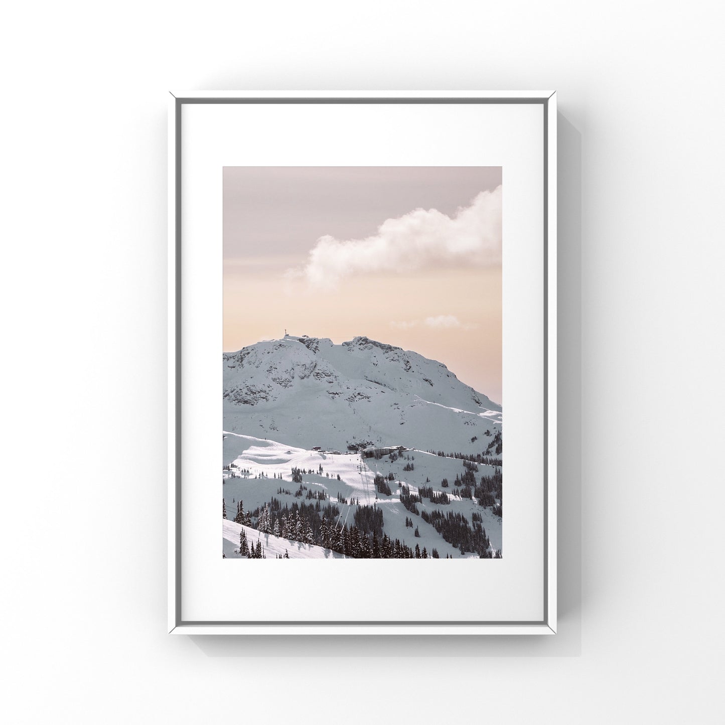 Photography print of a peach and pink mountain sunset on Whistler Mountain in the winter in British Columbia