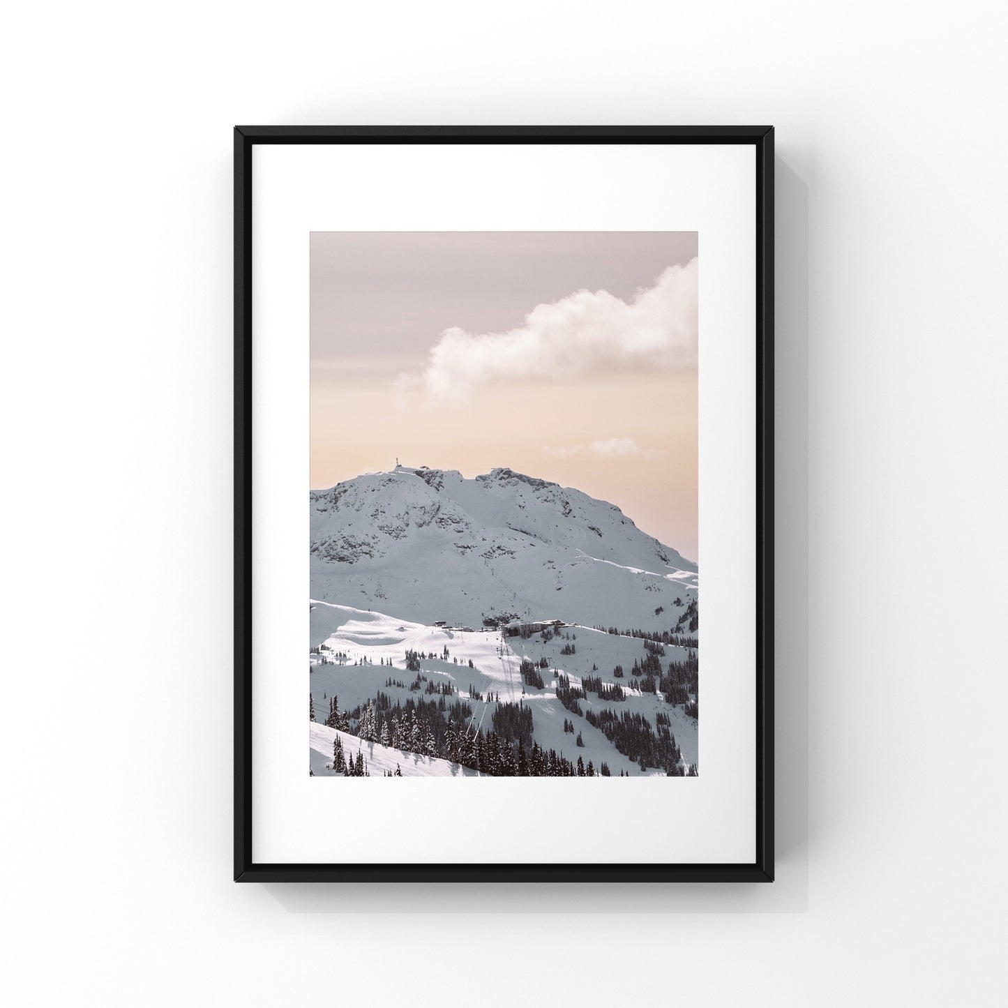 Photography print of a peach and pink mountain sunset on Whistler Mountain in the winter in British Columbia